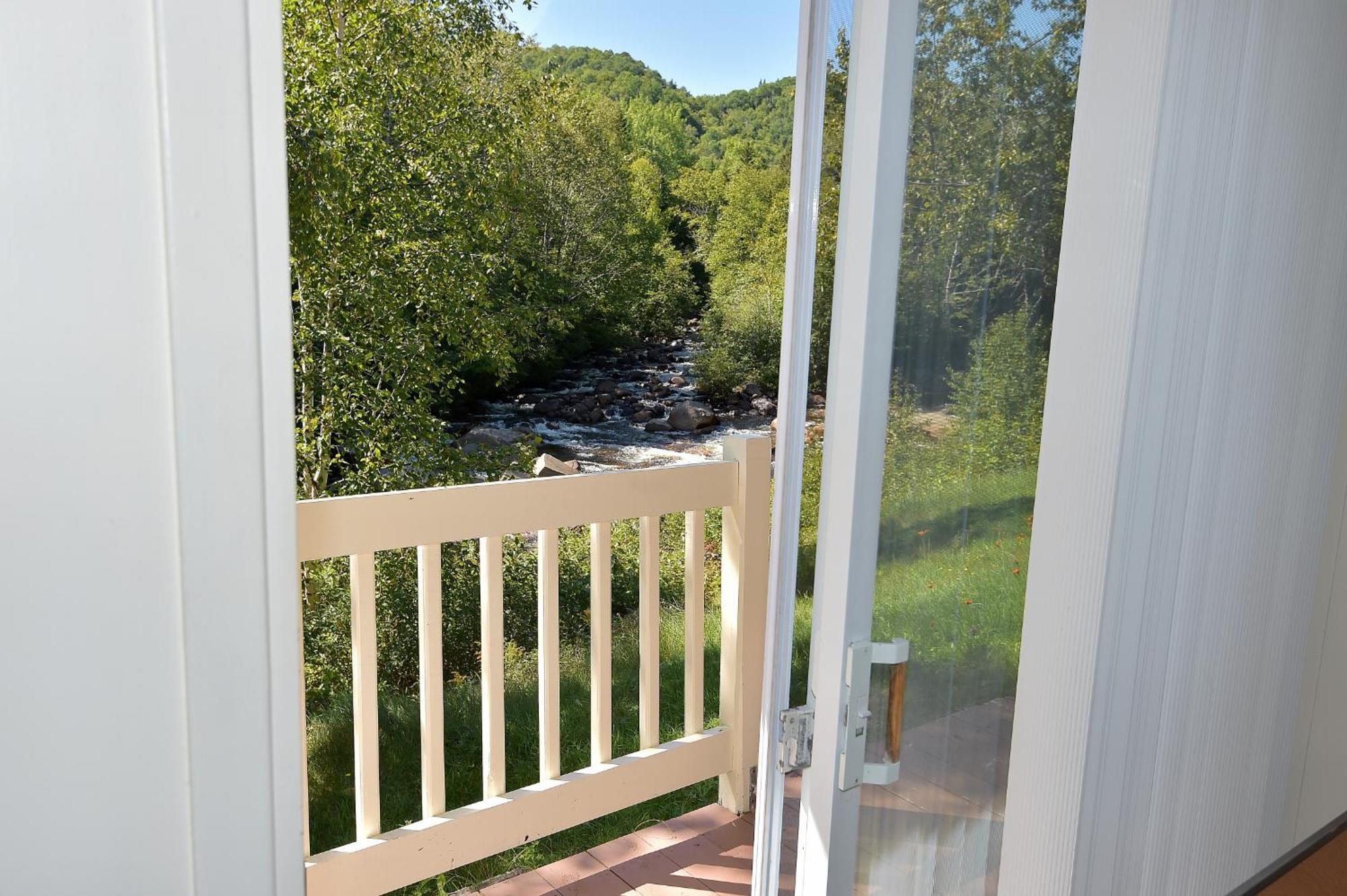 Motel Et Chalets Bo-Fleuve Evangeline Saint-Siméon Habitación foto